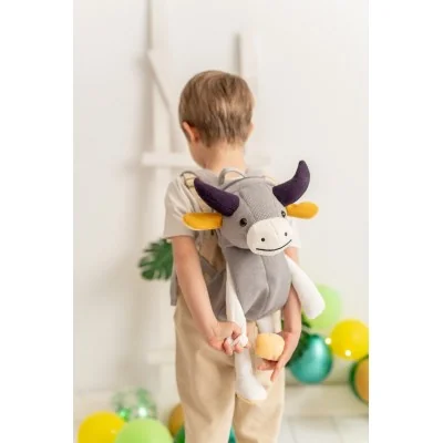 Enfant portant Sac à dos taureau Torito signé Crochetts Enfant portant Sac à dos taureau Torito signé Crochetts