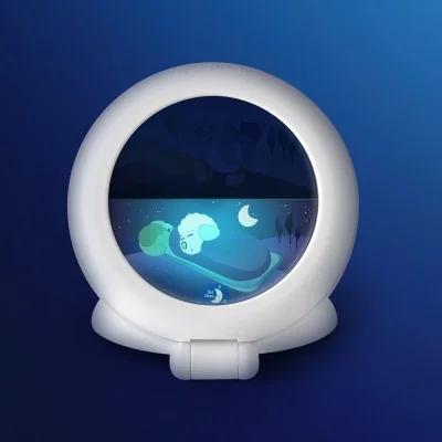 Indicateur de réveil Kid'Sleep Globetrotter - Blanc signé Pabobo en position sommeil Indicateur de réveil Kid'Sleep Globetrotter - Blanc signé Pabobo en position sommeil