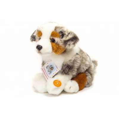 Peluche chiot berger australien assis - 22 cm signée Teddy Hermann, vue de demi-profil