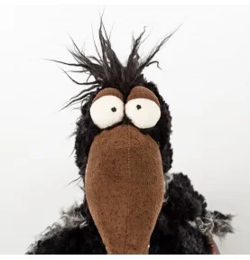 Peluche corbeau "July Jewels" signée Sigikid, gros plan sur la tête