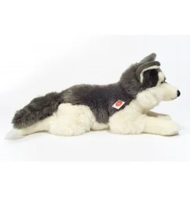 Peluche chien Husky couché - 60 cm signée Teddy Hermann, vue de profil Peluche chien Husky couché - 60 cm signée Teddy Hermann, vue de profil