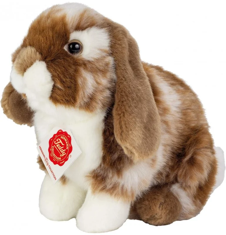 Peluche lapin assis tacheté marron foncé et blanc - 20 cm signée Teddy Hermann Peluche lapin assis tacheté marron foncé et blanc - 20 cm signée Teddy Hermann
