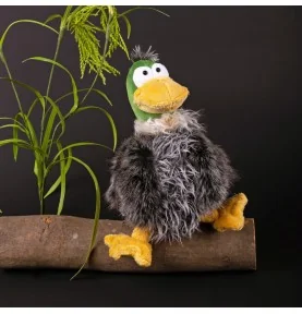 Peluche canard "Gacko Gack" signée Sigikid, assis sur une branche d'arbre