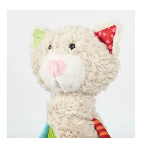 Doudou chat Patchwork Sweety signé Sigikid, gros plan sur la tête