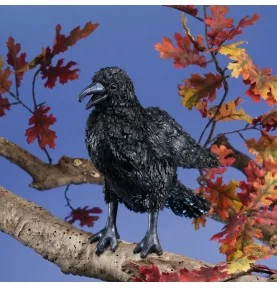 Marionnette corbeau signée Folkmanis, perché sur une branche Marionnette corbeau signée Folkmanis, perché sur une branche