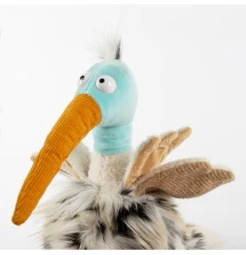 Peluche oiseau "Tobago Tom" signé Sigikid, gros plan sur la tête