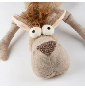 Peluche chameau "Desert Dandy" signée Sigikid, gros plan sur la tête Peluche chameau "Desert Dandy" signée Sigikid, gros plan sur la tête