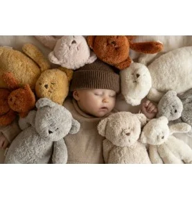 Bébé entouré d'Oursons magiques Moonie en coton bio de différentes couleurs Bébé entouré d'Oursons magiques Moonie en coton bio de différentes couleurs