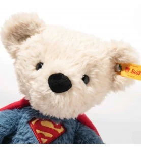 Ours en peluche Superman signé steiff, gros plan sur la tête Ours en peluche Superman signé steiff, gros plan sur la tête
